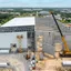 Sandwich Panel vs Beton Precast untuk Gudang 2026